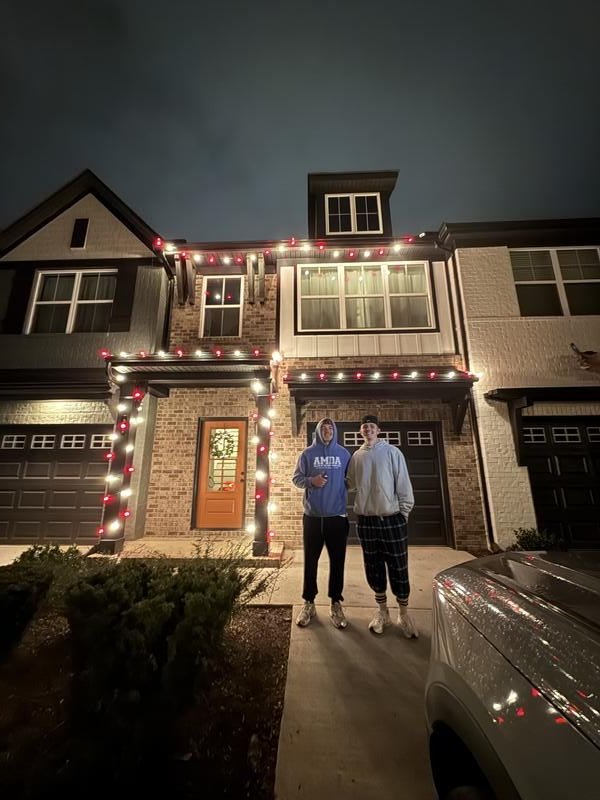 Rocky Top Christmas Crew team with red and white C9 installation