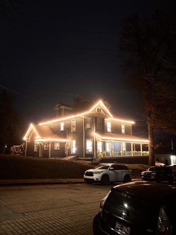 Warm white C9 lights on historic three story home
